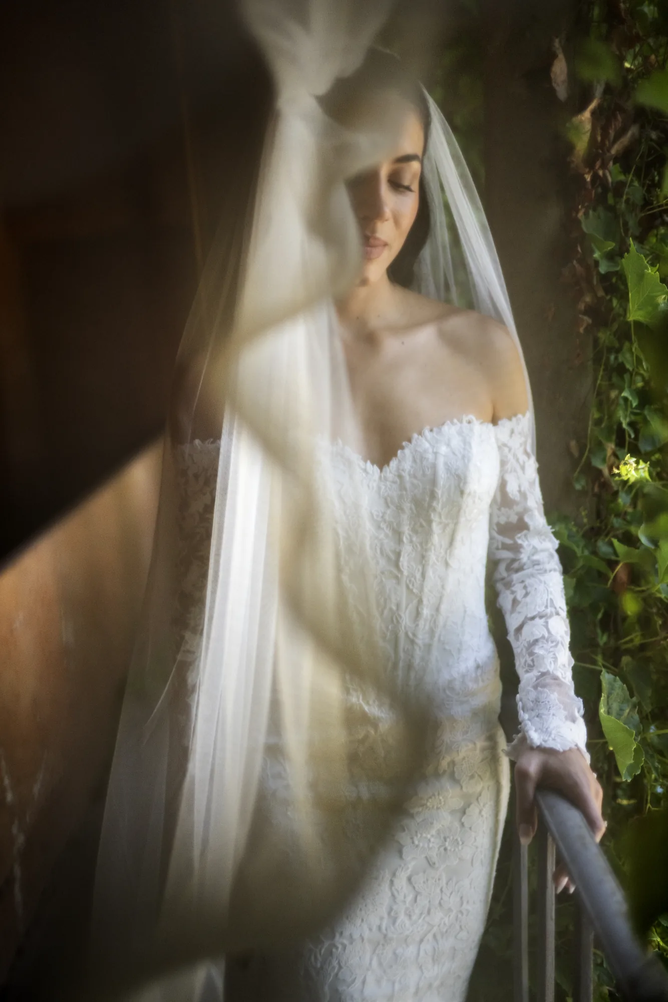 Bride in motion, her veil blurred in golden light